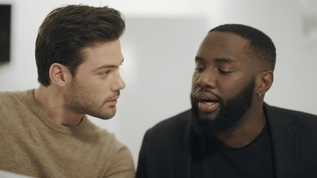 A close-up shot of two main characters in , engaged in an intense conversation, with subtle expressions that hint at hidden agendas and conflicting emotions.