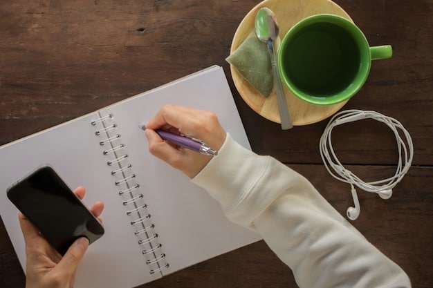 A close-up shot of a notebook and pen, symbolizing the process of taking notes while watching a TV episode to prepare for writing a recap. The notebook contains handwritten notes and scribbles.