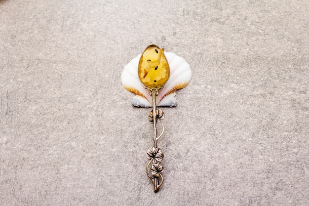 A symbol or object that represents a key theme from the episode, such as a broken mirror for betrayal or a wilting flower for loss. The image should be artistic and open to interpretation.