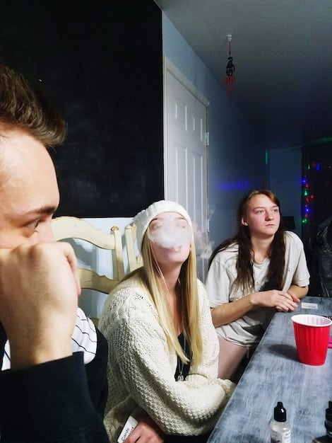 A shadowy group of VIPs watching the Squid Game proceedings from a luxurious viewing lounge, with expressions of detached amusement and indifference. The image should highlight the stark contrast between their privileged position and the desperate situation of the contestants.