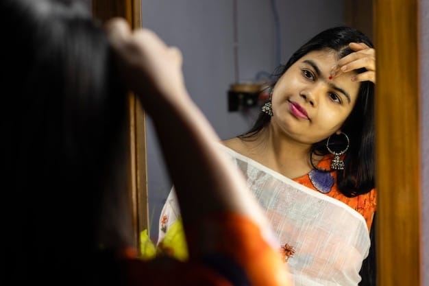 Shiv Roy standing in front of a mirror, fixing her hair. Her expression is a mix of determination and vulnerability, suggesting the internal conflict between her ambition and her personal life. The reflection shows her isolated, emphasizing her loneliness.