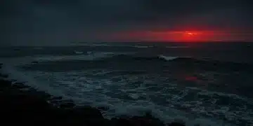 Stormy ocean with red glow, representing Crimson Tide Episode 7 twist