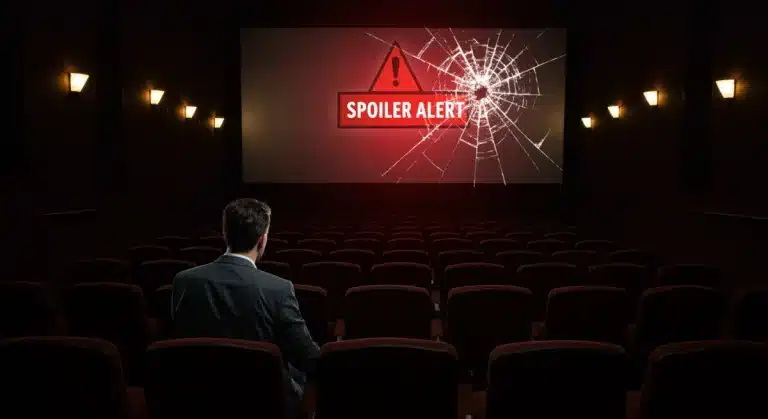 Empty movie theater with a 'spoiler alert' on screen, symbolizing financial loss from leaked movie endings.
